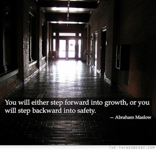 Image of dark, empty hallway with quote by Abraham Maslow