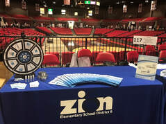 Table with Job Fair materials displayed